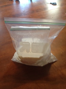 Ice cream mixture sealed in a large bag of ice and rock salt